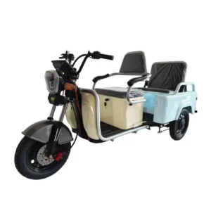 Triciclu electric FORTE CARGO 300 PRO-B02 cu motor de 2200 W și benă utilitară, vedere laterală.